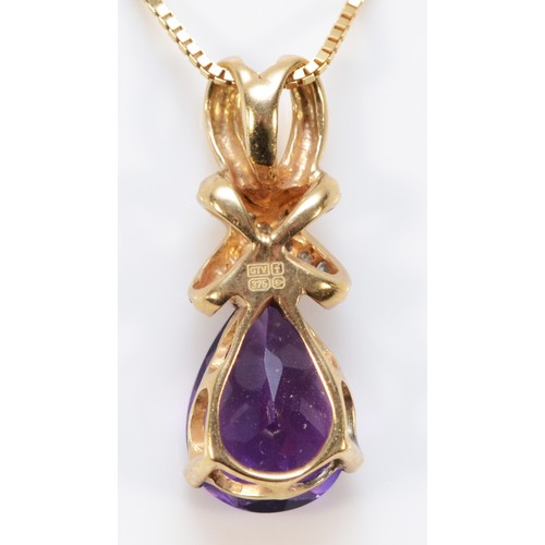 595 - A 9ct gold pear cut amethyst pendant with a 9ct gold chain, 10mm x 7mm amethsyt, 3.2g