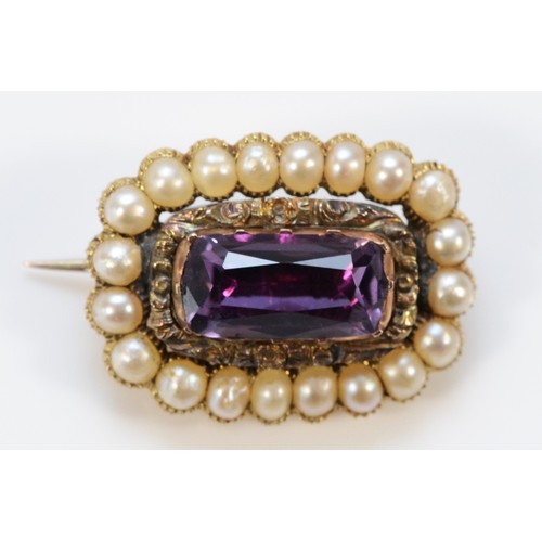 599 - A 9ct gold Georgian foil backed amethyst and seed pearl brooch, amethyst is a possible later additio... 