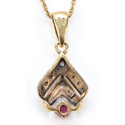 607 - A 9ct gold ruby and diamond pendant with chain, 13mm pendant length, 2g