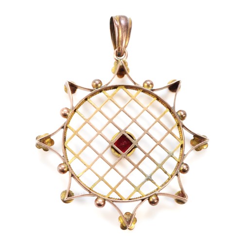 608 - A 9ct gold antique garnet topped doublet and seed pearl pendant, 33mm diameter, 3.4g