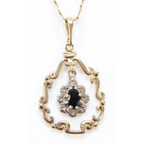 609 - A 9ct gold vintage sapphire and diamond pendant with chain, 23mm total length, 3.4g