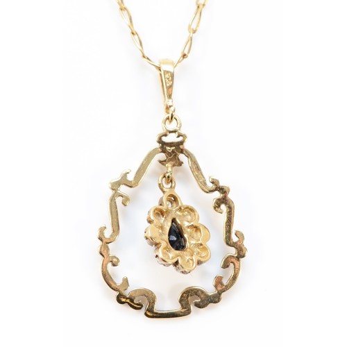 609 - A 9ct gold vintage sapphire and diamond pendant with chain, 23mm total length, 3.4g