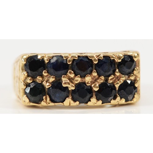 614 - A 9ct gold vintage sapphire double row dress ring, K, 4.1g