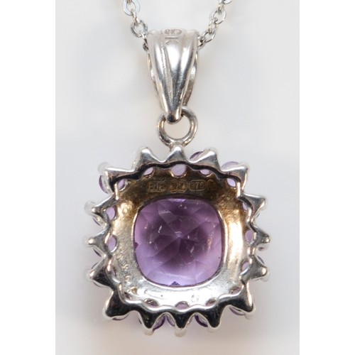 625 - A 9ct white gold faceted amethyst cluster pendant with chain, 8mm x 8mm main amethyst, 3g