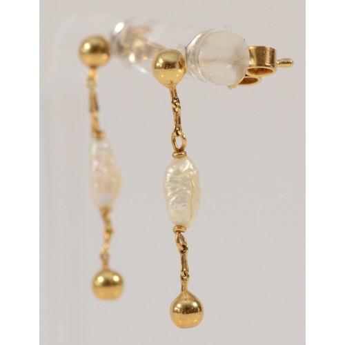 626 - A pair of 9ct gold rice pearl drop earrings with scroll backs, 23mm total drop, 1.3g