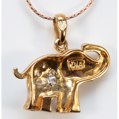 629 - A 9ct gold pave set diamond elephant pendant with chain, 16mm across, 2g