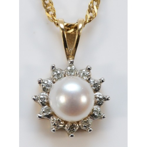 634 - A 9ct gold cultured pearl and diamond cluster pendant with chain, 10mm diameter, 2.7g