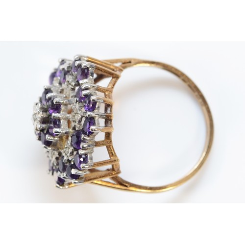 636 - A 9ct gold amethyst and diamond cluster cocktail ring, 18mm ring front, P, 4.6g