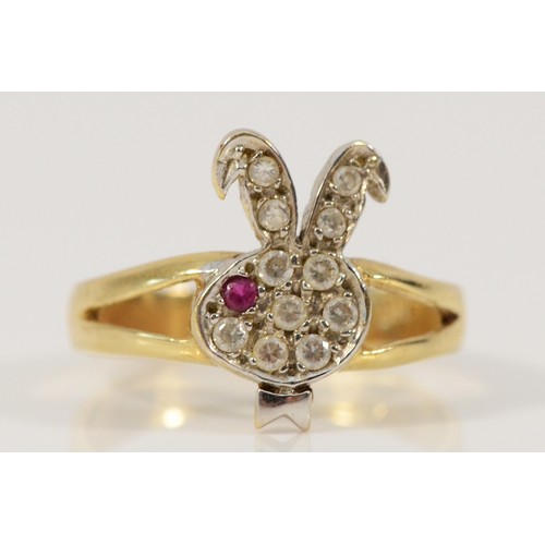 647 - A 14k gold cubic zirconia and red gemstone Playboy dress ring, J 1/2, 2.2g