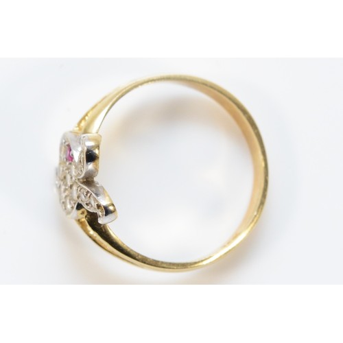 647 - A 14k gold cubic zirconia and red gemstone Playboy dress ring, J 1/2, 2.2g