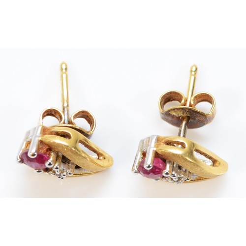 652 - A pair of 18ct gold ruby and diamond earrings with scroll backs, 10mm length, 2.5g