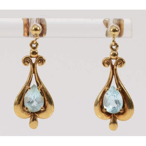 653 - A pair of 9ct gold vintage style blue topaz drop earrings with scroll backs, 25mm total drop, 2.3g