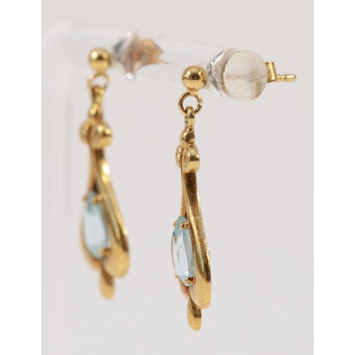 653 - A pair of 9ct gold vintage style blue topaz drop earrings with scroll backs, 25mm total drop, 2.3g