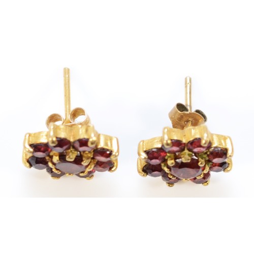 654 - A pair of 9ct gold vintage garnet cluster earrings with scroll backs, 10mm diameter, 2.2g