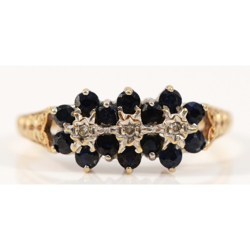 657 - A 9ct gold vintage sapphire and diamond cluster ring, misshapen band, K 1/2, 2.1g