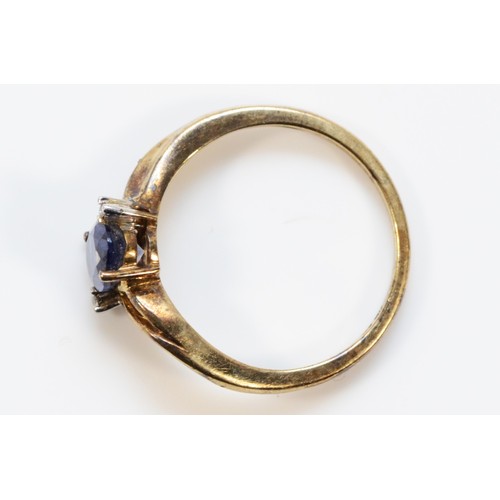 667 - A 9ct gold iolite dress ring with diamonds, N, 2g