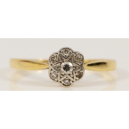 669 - An 18ct gold vintage brilliant cut diamond floral cluster ring, P, 2g