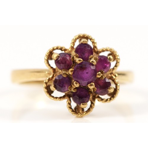 680 - A 9ct gold vintage ruby floral cluster ring, London 1975, L, 3g