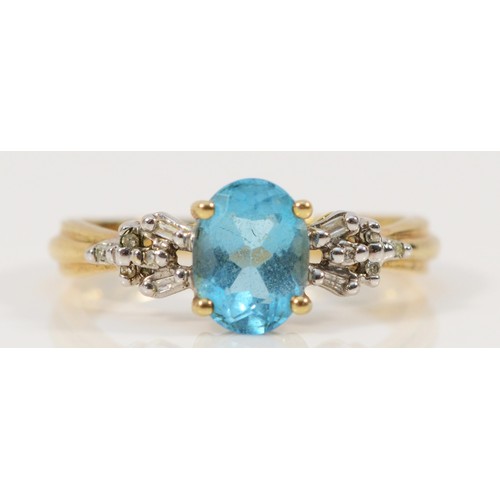 685 - A 9ct gold vari cut diamond and blue topaz dress ring, 7mm x 5mm topaz, N, 2.5g