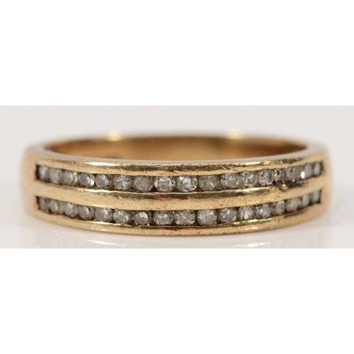 686 - A 9ct gold channel set two row single cut diamond half eternity ring, stated 0.25ct diamond weight, ... 