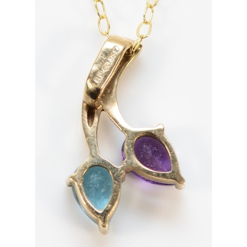 713 - A 9ct gold amethyst and blue topaz pendant with chain, 16mm pendant length, 1.3g