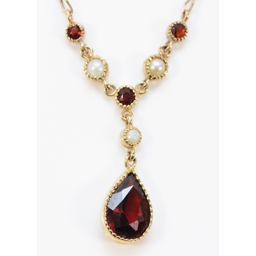 717 - A 9ct gold garnet and seed pearl necklace, 10mm x 6mm main garnet, 3g