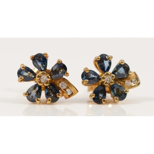 719 - A pair of 9ct gold vintage sapphire and cubic zirconia floral earrings with scroll backs, 10mm, 1.7g