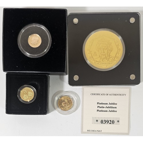 114 - A 1985 1/10 Krugerrand, a 2017 proof Double Head quarter sovereign, a 2017 quarter sovereign, certif... 