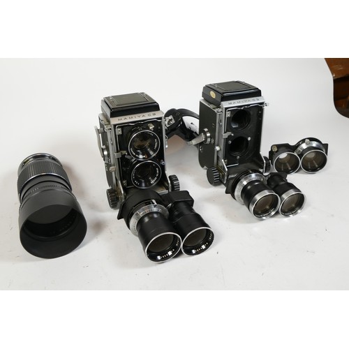 87 - Mamiya TLR Cameras and Equipment, including Two Mamiya C3 bodies, a pair of 80mm f/2.8 Sekor lenses,... 