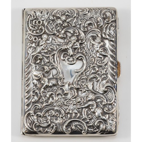 3 - An Edwardian silver card case, by William Comyns, London 1902, with embossed cherub and scroll decor... 