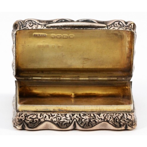 12 - A Victorian silver snuff box, by Thomas Millward & Co., Birmingham 1883, of rectangular form with in... 