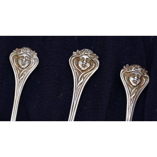 15 - A German Art Nouveau set of six .800 standard silver gilt coffee spoons, Crescent, Crown, 800, Eagle... 