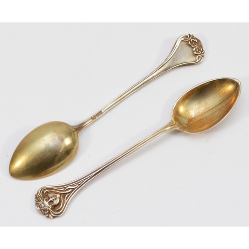 15 - A German Art Nouveau set of six .800 standard silver gilt coffee spoons, Crescent, Crown, 800, Eagle... 