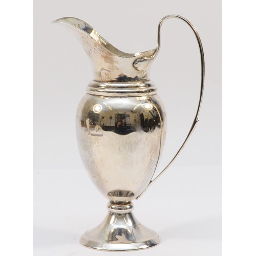 19 - A silver ewer jug, London 1919, with sweeping handle, 17cm, 166gm