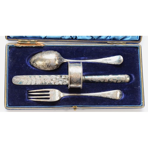 22 - A Victorian four piece christening set Sheffield 1899, with engraved floral decoration and monogram,... 