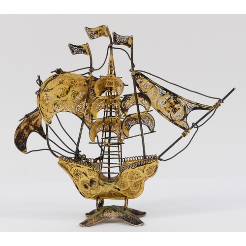 34 - A silver gilt filigree and enamel three mask Maltese sailing ship, probably Portuguese, apparently u... 