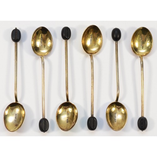 44 - A silver and enamel set of six coffee bean spoons, Birmingham 1928, 9.5cm, 47gm, case