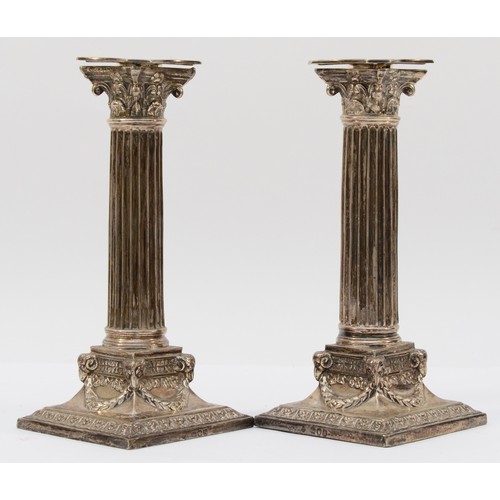 49 - A Victorian pair of silver Corinthian column candlesticks, by Martin & Hall, London 1892/3, detachab... 