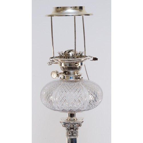 53 - An impressive silver column oil lamp, by Daniel & Arter, Birmingham 1913, the acanthus leaf faceted ... 