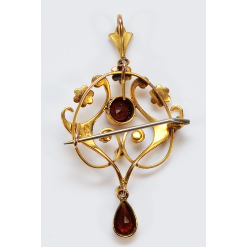 71 - A 9ct gold Edwardian garnet and seed pearl brooch pendant, 5mm central garnet, 50mm total brooch len... 