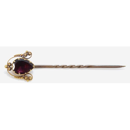 73 - An unmarked 18ct gold Georgian flat cut garnet stick pin, base metal pin, 8mm x 5mm garnet, 50mm tot... 