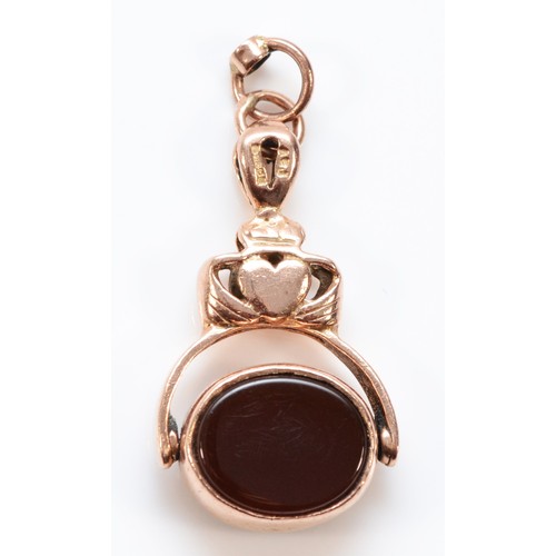 78 - A 9ct rose gold vintage bloodstone and carnelian Claddagh spinning fab, Birmingham 1992, 25mm total ... 