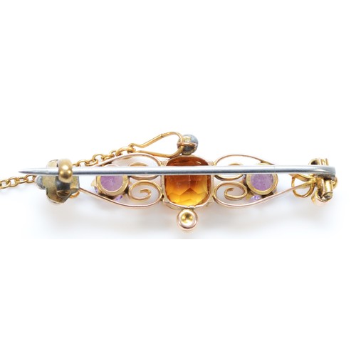 92 - An unmarked 9ct gold antique citrine, amethyst and seed pearl brooch, central citrine measures 7mm x... 