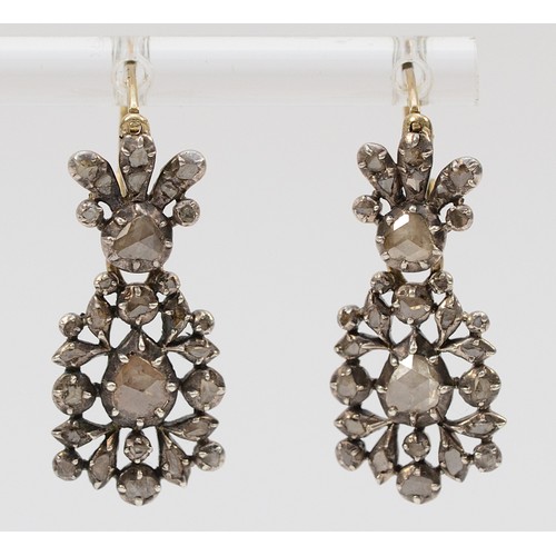 A Georgian pair of unmarked gold and silver set rose cut diamond drop earrings, 25mm total earring length, 7g