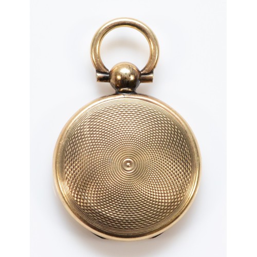 140 - A 9ct gold Victorian locket in the form of a pocket watch, glass in one side, 20mm diameter, 4.9g