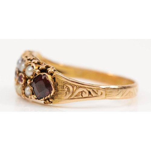 147 - A 15ct gold antique garnet and seed pearl dress ring, Birmingham 1878, engraved pattern around the w... 