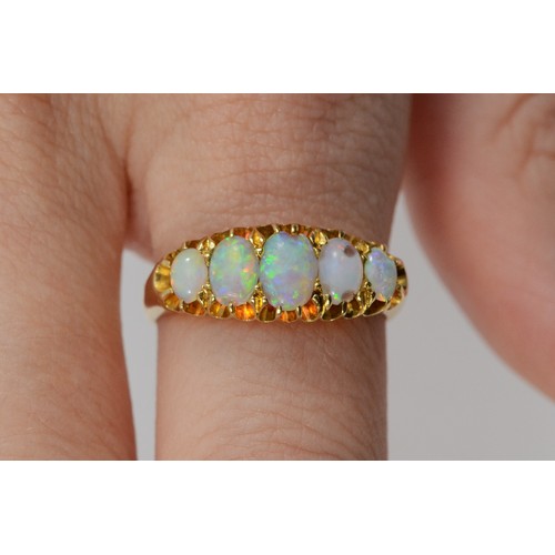 152 - An 18ct gold antique opal five stone ring, graduating opal sizes, largest is 6mm x 4mm, three opals ... 