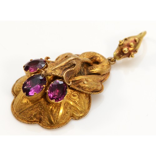 160 - An unmarked 15ct gold Victorian almandine garnet pendant, bearing a snakes head hanger, intricate en... 