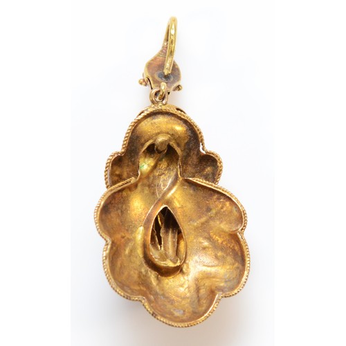 160 - An unmarked 15ct gold Victorian almandine garnet pendant, bearing a snakes head hanger, intricate en... 