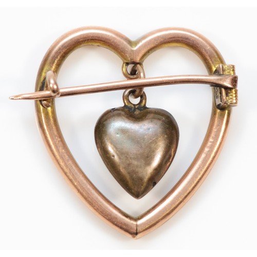 172 - A Victorian 9ct rose gold and enamel heart brooch, 9ct tab, with articulated heart centre, 25 x 22mm... 